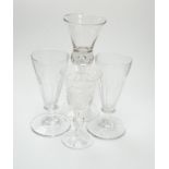 A pair of early 19th century dwarf ale glasses with fluted conical bowls, bladed knop stems and