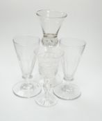 A pair of early 19th century dwarf ale glasses with fluted conical bowls, bladed knop stems and