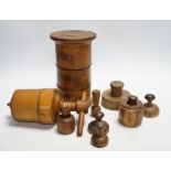 Treen - a Victorian spice tower 18.5cm high, seven butter pats and a boxwood squeezer