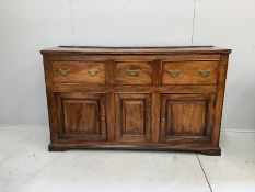 A late 18th / early 19th century elm low dresser, width 153cm, depth 48cm, height 92cm