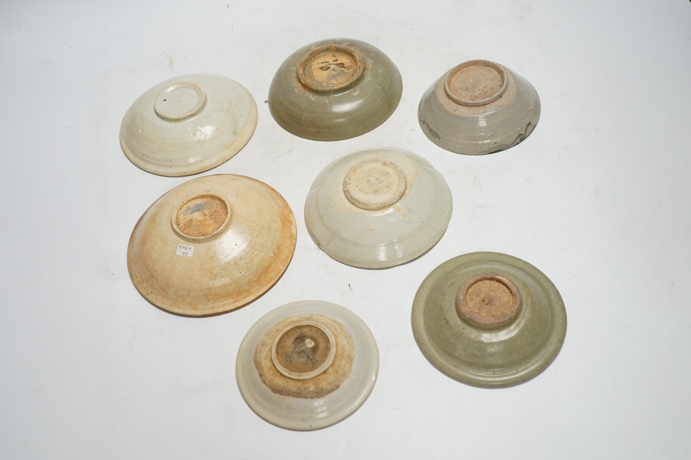 A group of seven Chinese Ding type, qingbai and celadon dishes, Song-Yuan dynasty, largest 15.5cm - Image 5 of 5