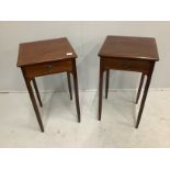 A pair of reproduction George III style mahogany bedside tables, with blind fret aprons, on square