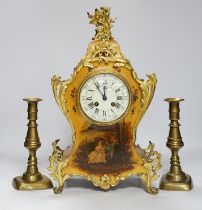 A late 19th century French Vernis Martin ormolu mounted clock with key and pendulum and a pair of