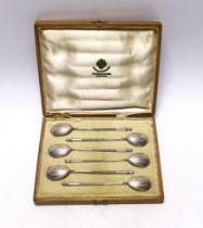 A cased set of six late 19th/early 20th century Russian 84 zolotnik teaspoons with engraved bowls,