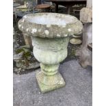 A reconstituted stone campana garden urn, diameter 47cm, height 68cm