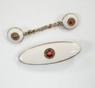 An early 20th century Russian 84 zolotnik and two colour enamel tie clip, 33mm and cloak clasp.