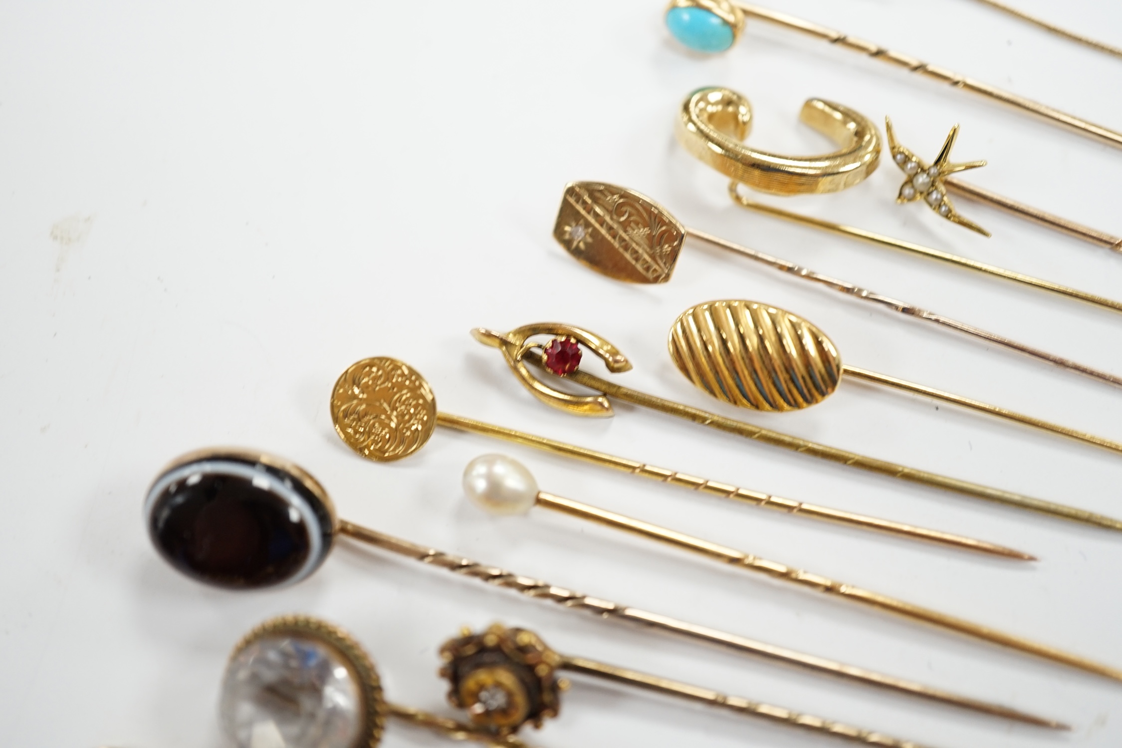 Fifteen assorted mainly early 20th century yellow metal and gem set stick pins, including diamond, - Image 9 of 11