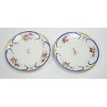 A pair of Alexander II Russian Imperial porcelain ‘Peterhof-Palast’ floral rim plates, 19cm (a.f.)