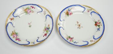 A pair of Alexander II Russian Imperial porcelain ‘Peterhof-Palast’ floral rim plates, 19cm (a.f.)