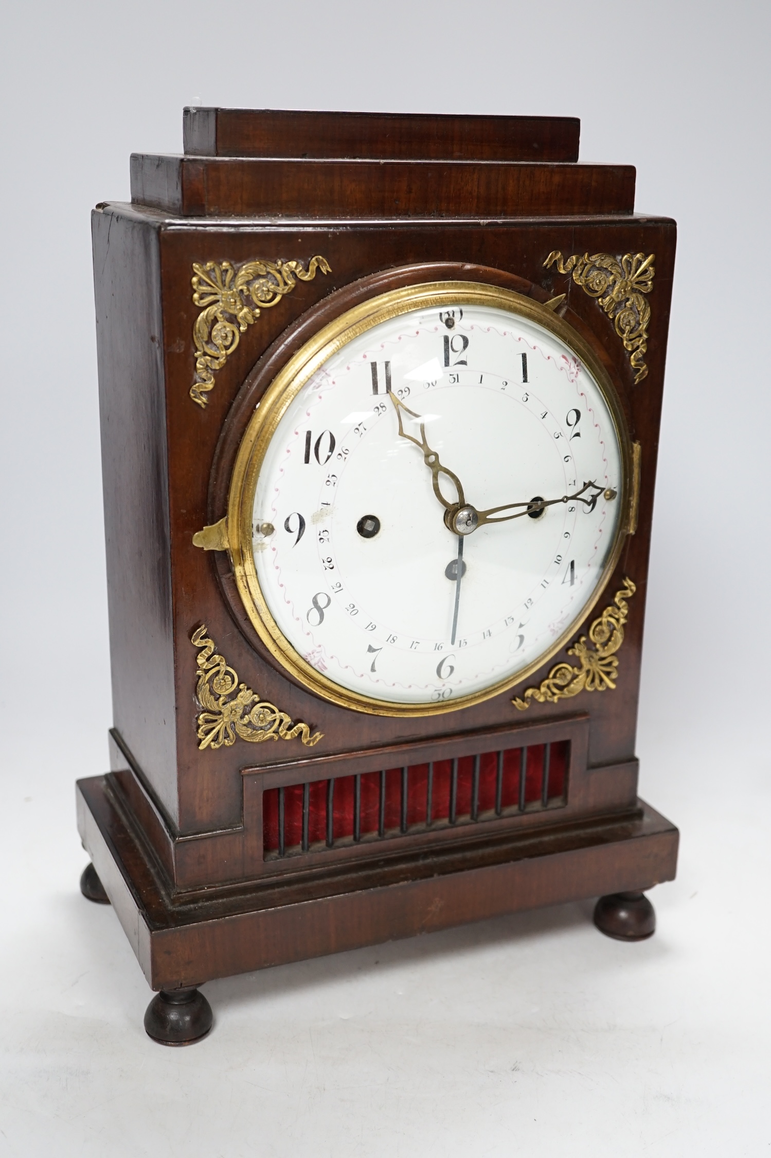 An early 19th century French thirty day mahogany mantel clock, no key or pendulum, 36cm