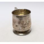 A George V silver christening mug, maker W. Neale Ltd, Birmingham 1927, 76mm.