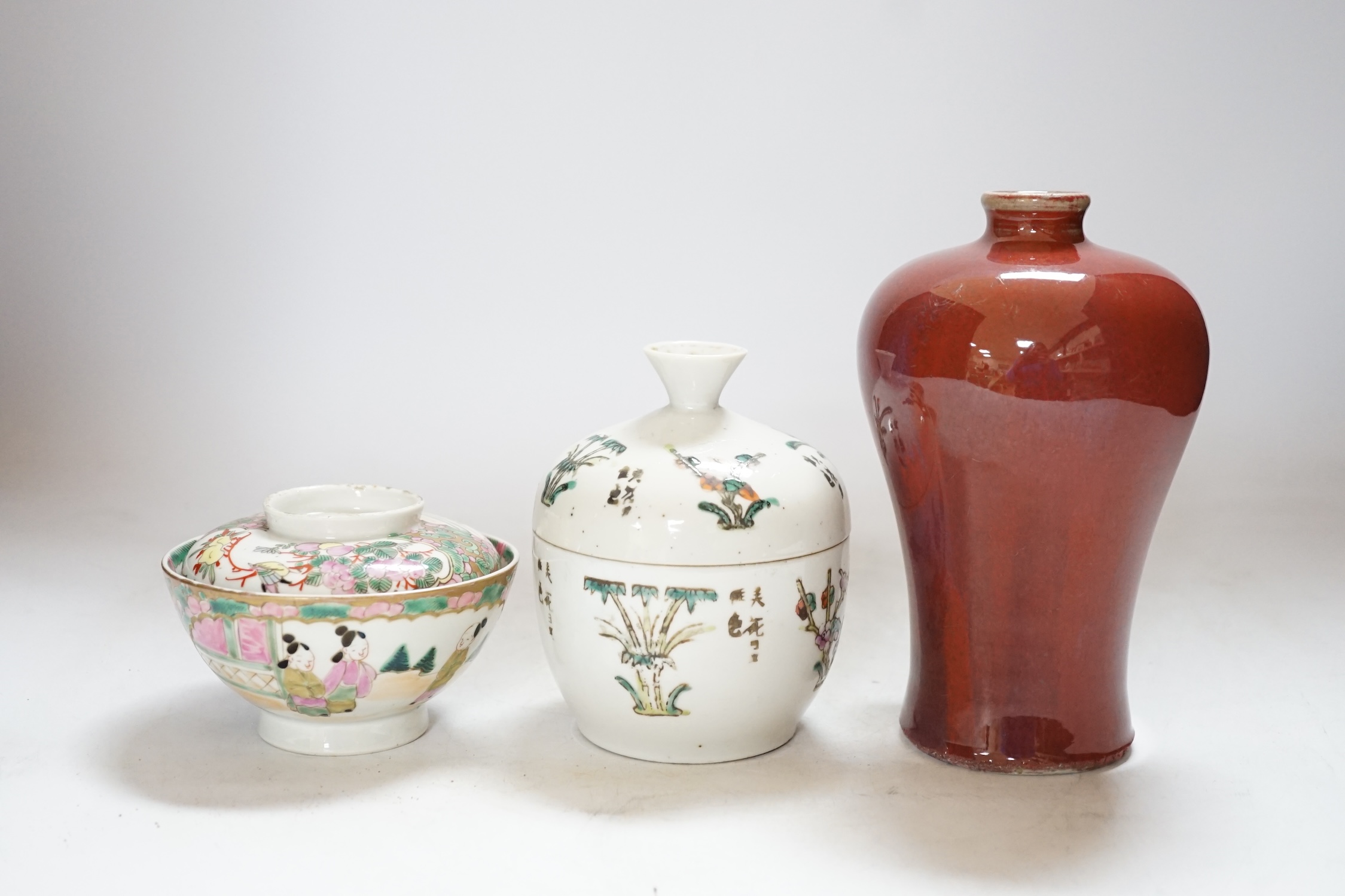 A Chinese sang de boeuf vase, 17.5cm high, and two others