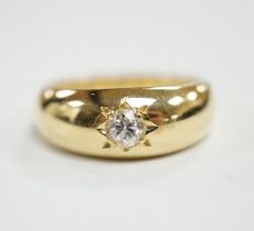 An 18ct gold and gypsy set solitaire diamond ring, size Q, gross weight 6.7 grams.