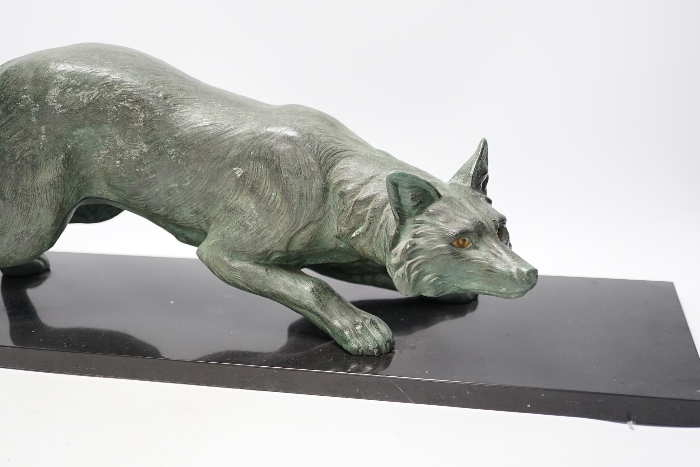 A bronzed metal model of a stalking fox, on black marble plinth, 62cm - Image 3 of 6