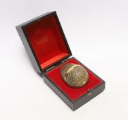 An Elizabeth II silver gilt surprise egg, by Stuart Devlin, London, 1973, numbered 223, opening to