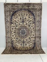 A fine Nain ivory ground carpet, 290 x 191cm