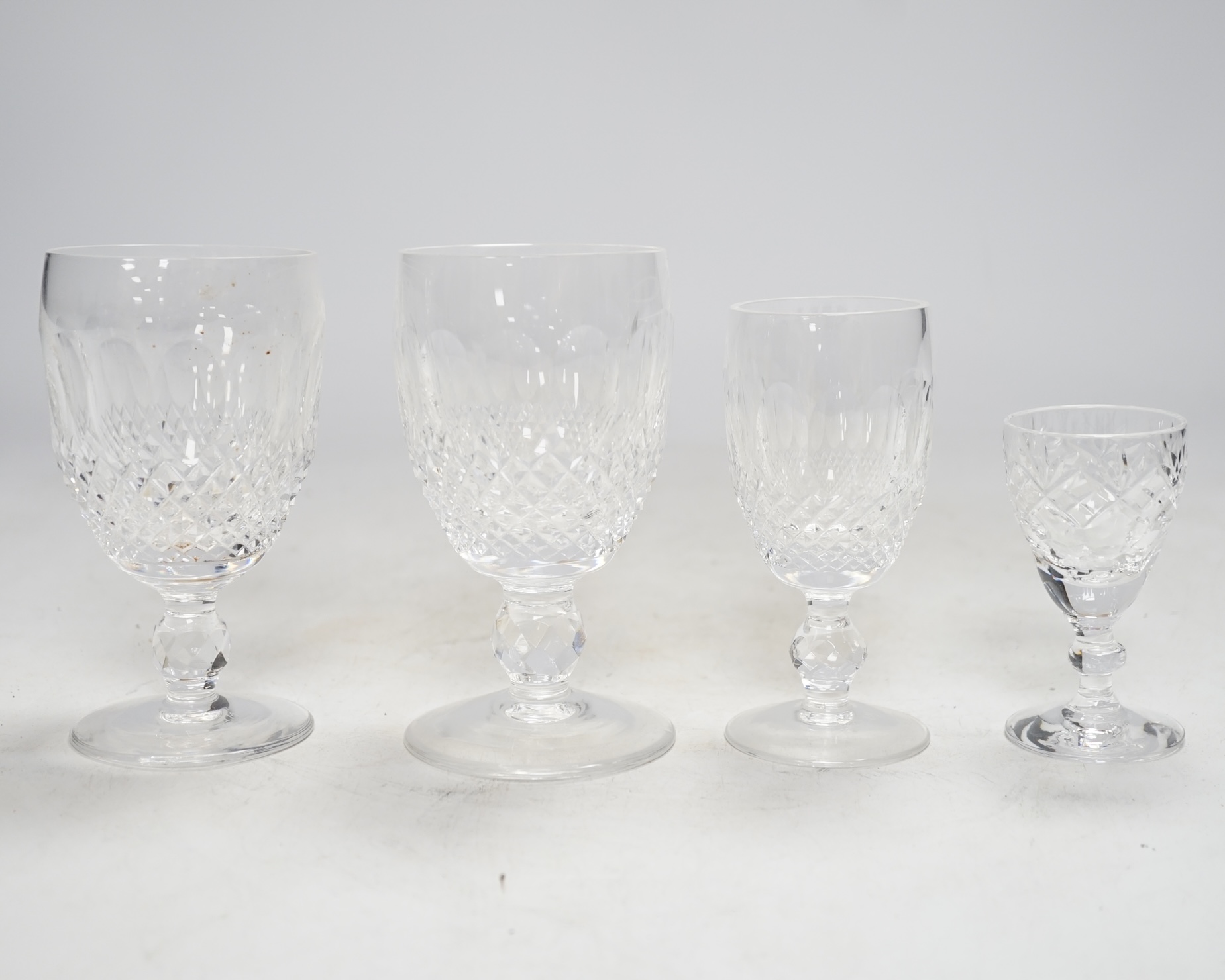 A small collection of Waterford crystal and other cut glass drinking glasses, highest 12cm, (18)