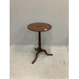 A George III circular oak tripod wine table, diameter 43cm, height 68cm