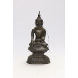 A 19th century Burmese bronze figure of Buddha, 26cm high