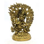 A Sino Tibetan gilt bronze figure of Mahakala