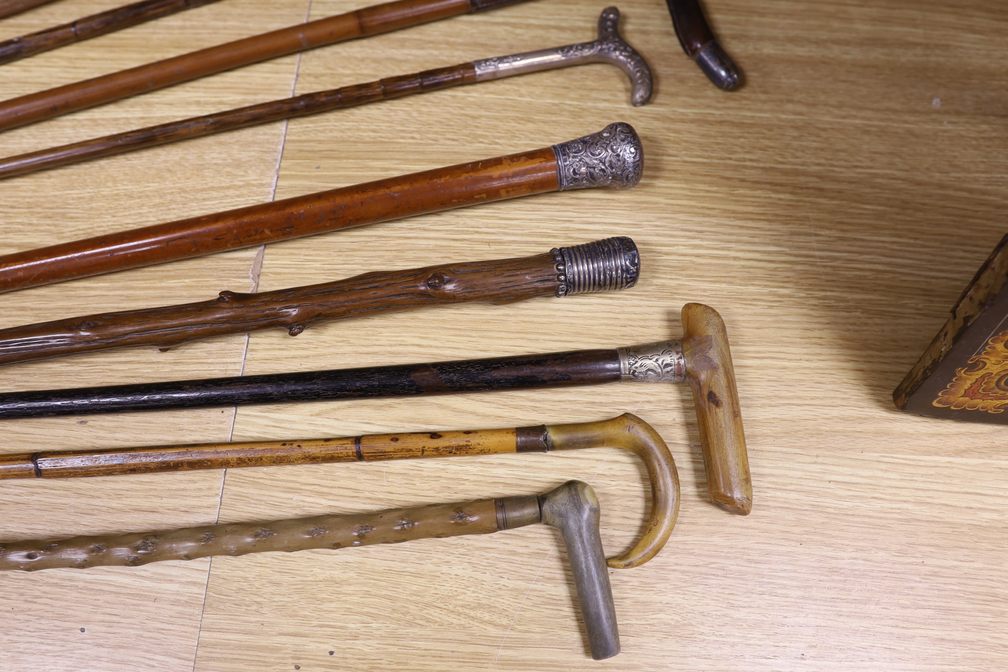 Four various decorative Victorian silver mounted walking sticks/canes, three horn handled canes - Image 2 of 4