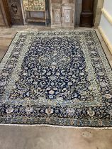 A North West Persian blue ground carpet, 344 x 276cm