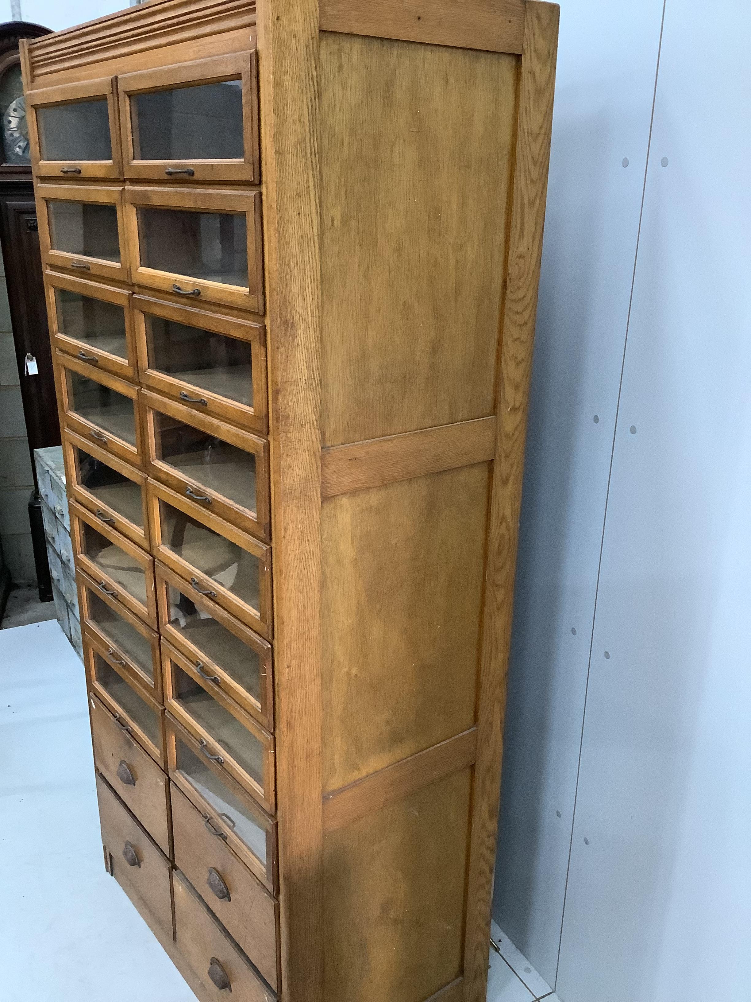 A mid century oak twenty drawer haberdashery cabinet, width 92cm, depth 51cm, height 197cm - Image 2 of 2