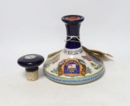 A commemorative ceramic decanter for HMS victory at the Battle of Trafalgar 1805, containing British