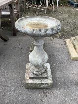 A reconstituted stone baluster bird bath, height 69cm