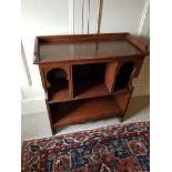 An early 20th century Moorish style Blackie & Son Limited oak open bookcase, width 77cm, depth 33cm,