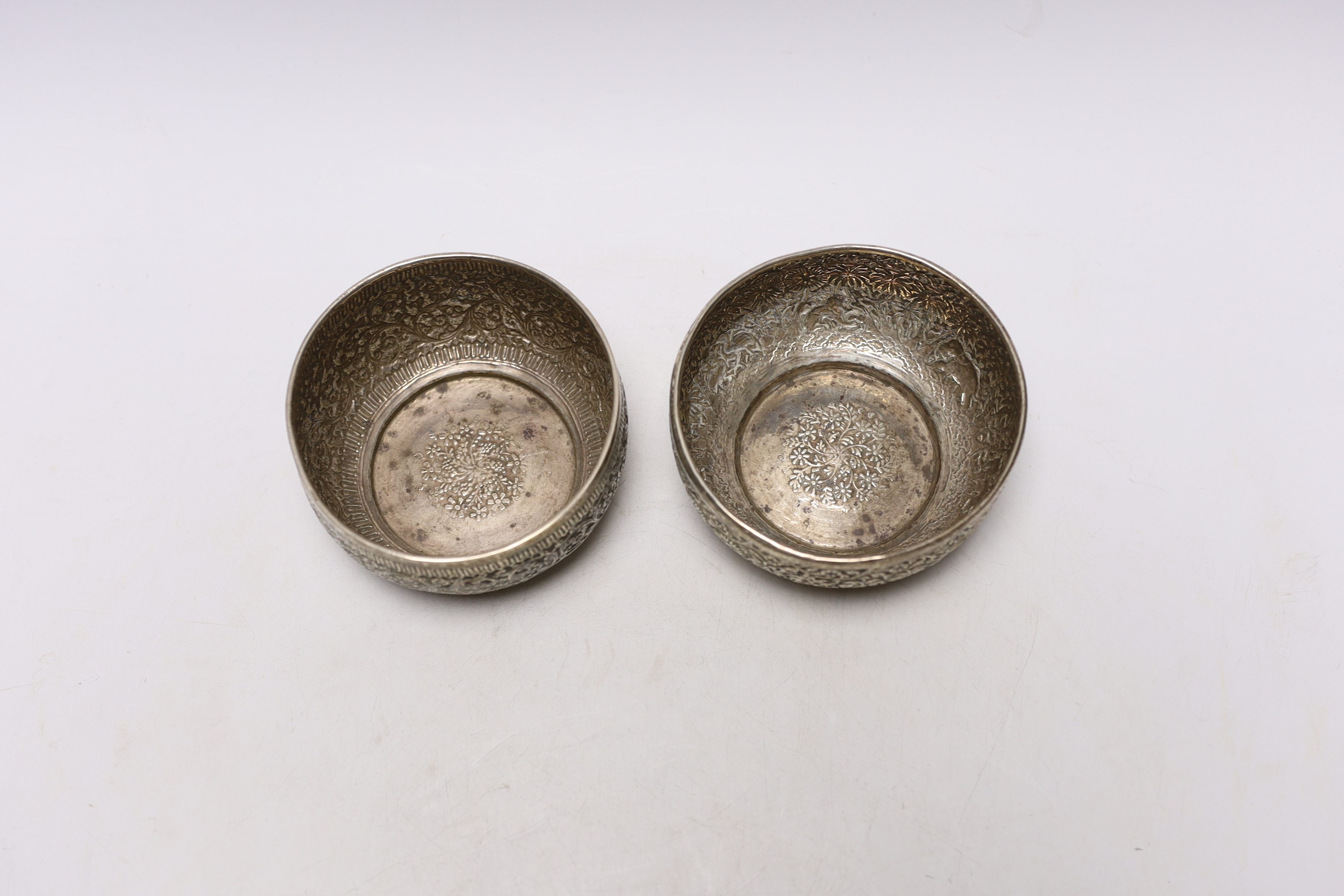 A pair of Indian embossed white metal finger bowls, 10cm, 7.5oz. - Image 3 of 4