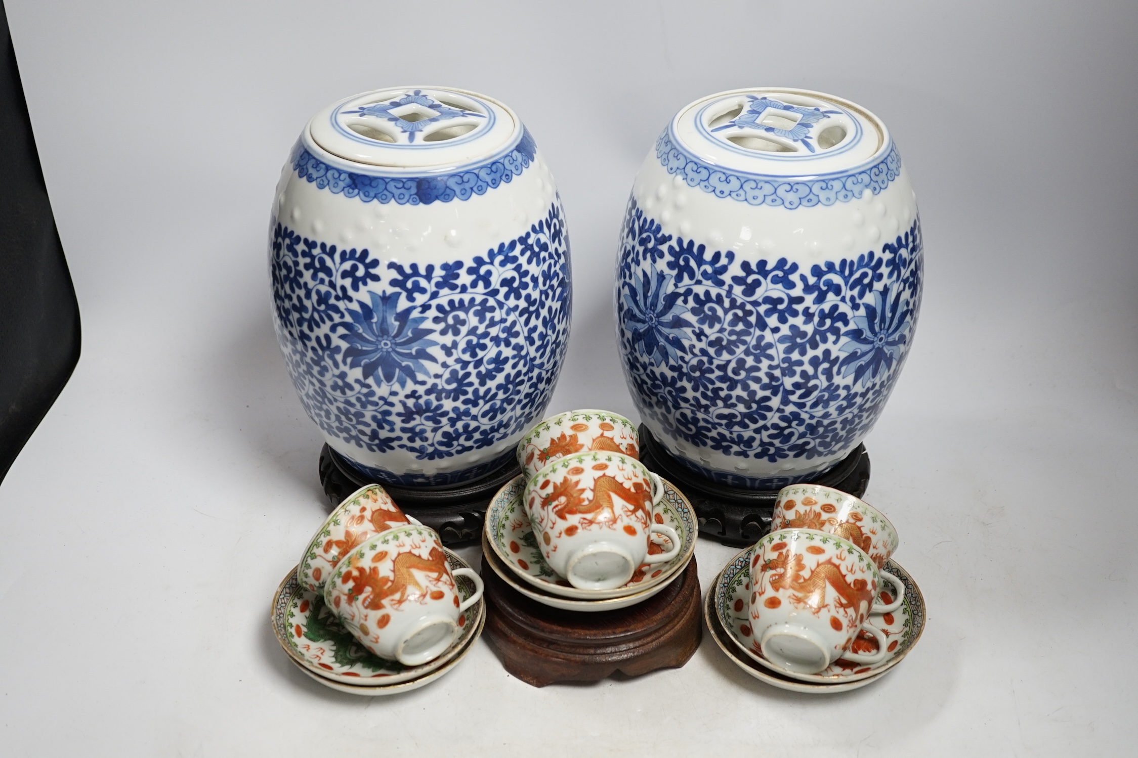 A pair of Chinese blue and white barrel jars, various cups and saucers and three hardwood stands, - Image 2 of 5