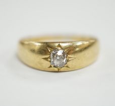 An 18ct gold and gypsy set solitaire diamond ring, size P/Q, gross weight 5 grams.