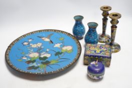 Seven Chinese or Japanese cloisonné enamel items including a pair of candlesticks, 15cm high, a