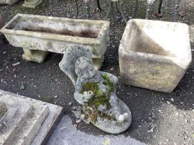 Two reconstituted stone trough garden planters and a seated gnome garden ornament, largest width