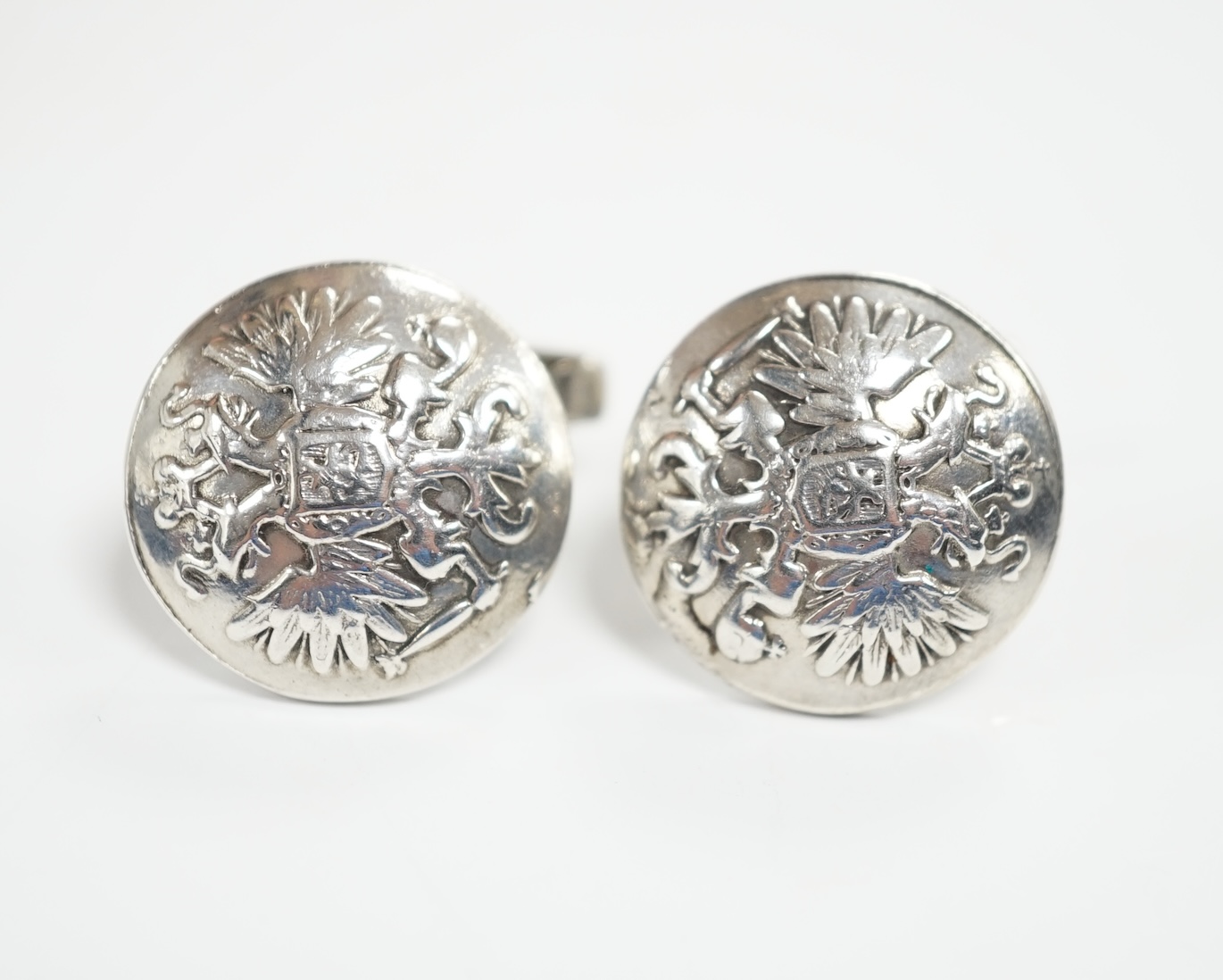 A pair of Russian 925 circular button cufflinks, embossed with the Coat of Arms of Russia, verso