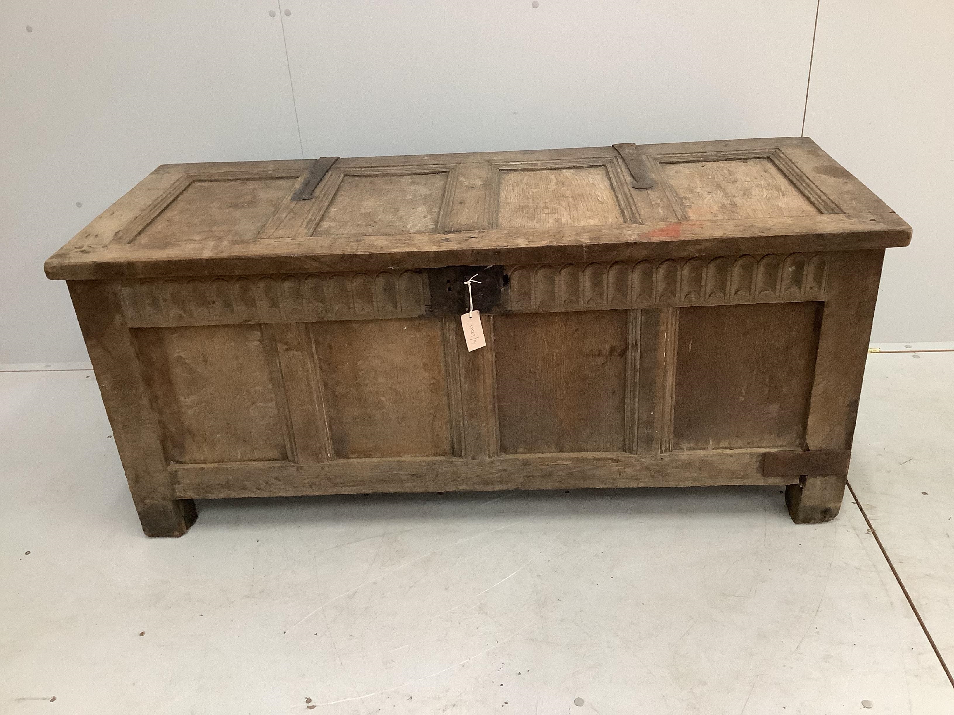 An 18th century and later oak coffer, width 143cm, depth 58cm, height 64cm