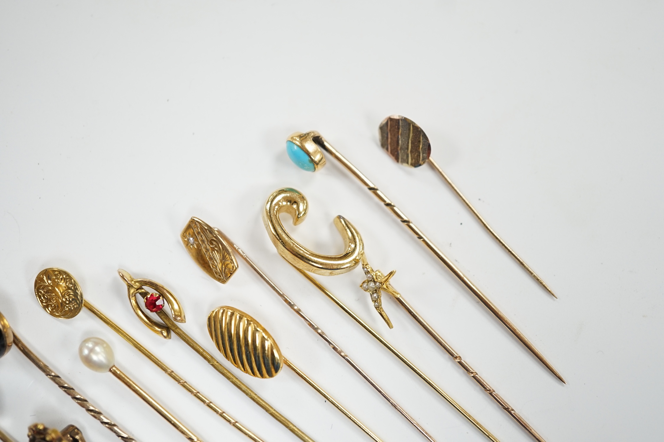 Fifteen assorted mainly early 20th century yellow metal and gem set stick pins, including diamond, - Image 2 of 11