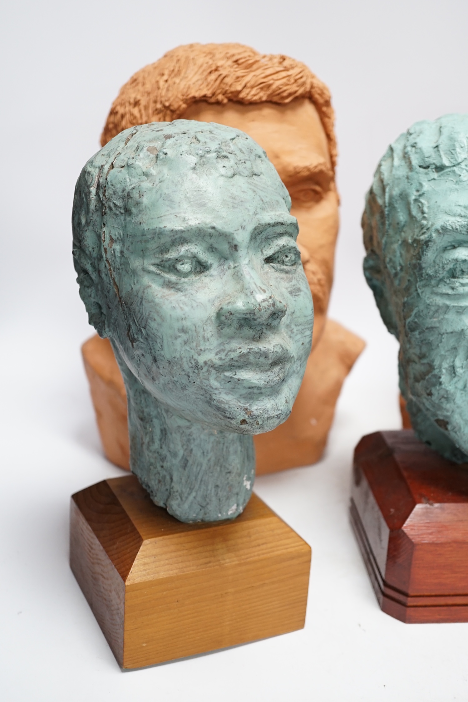 Four art pottery sculpted heads on stands, two terracotta and two painted verdigris green, largest - Image 2 of 5
