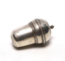 A continental white metal nutmeg grater?, modelled as an acorn, lacking rasp, makers mark to lid