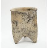 A Chinese neolithic pottery tripod vessel, 11.5cm tall