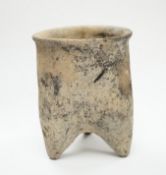 A Chinese neolithic pottery tripod vessel, 11.5cm tall