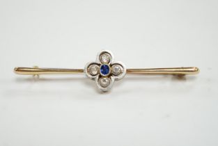 An Edwardian 15ct, sapphire and simulated diamond set four stone bar brooch, 55mm, gross weight 4.