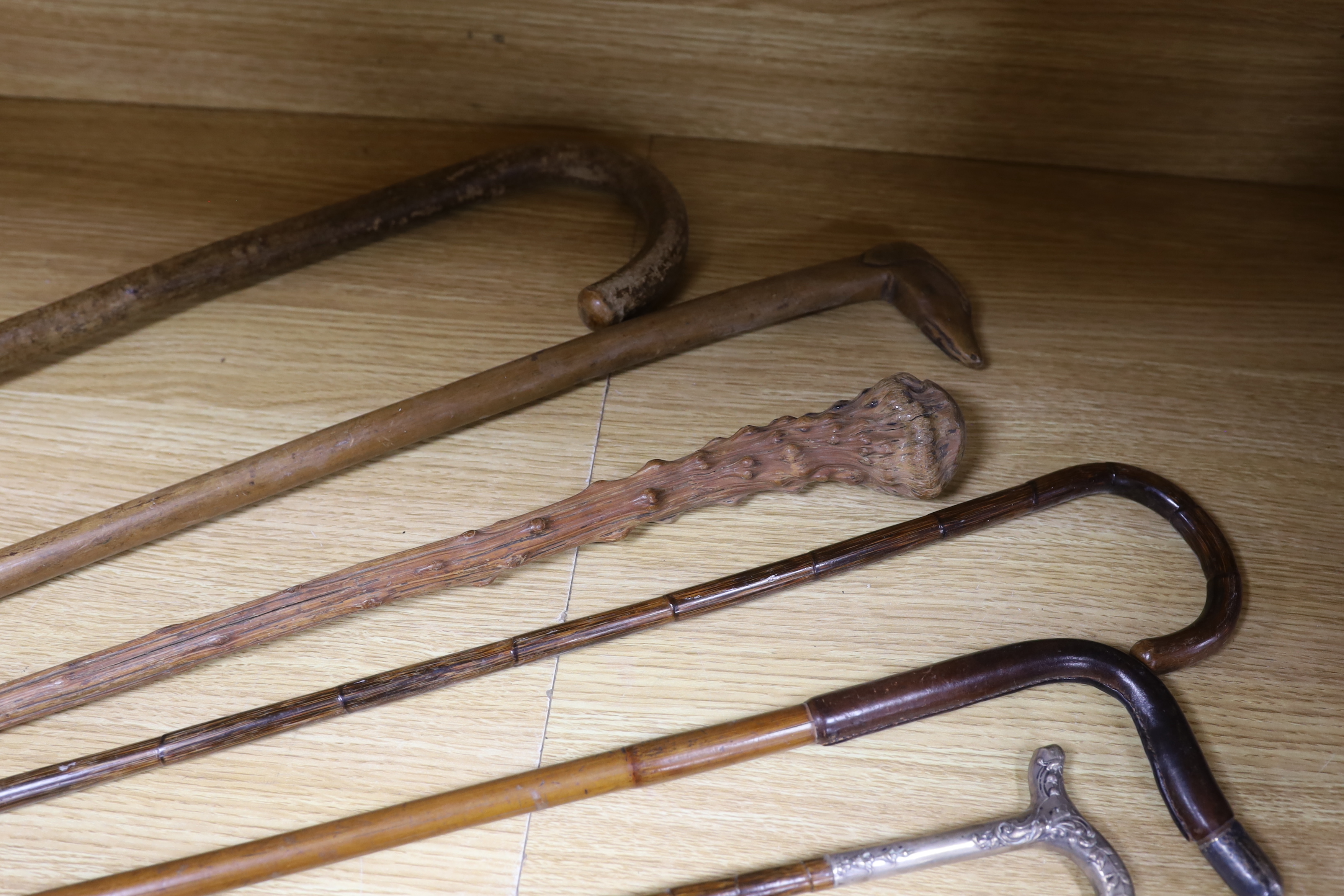 Four various decorative Victorian silver mounted walking sticks/canes, three horn handled canes - Image 3 of 4