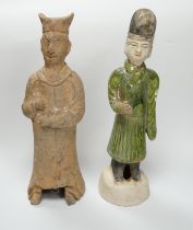 A Chinese grey pottery figure, Han dynasty, and a green glazed figure, Ming dynasty, 23cm