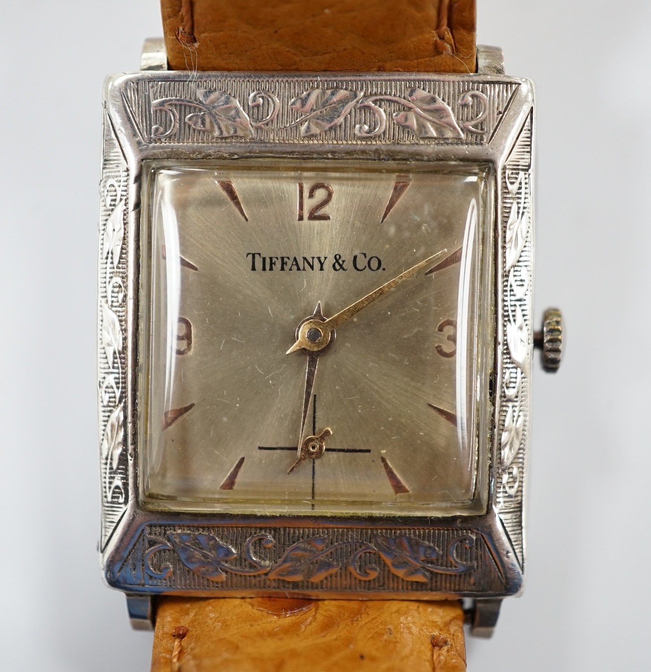 A German sterling manual wind dress wrist watch, retailed by Tiffany & Co, with baton and