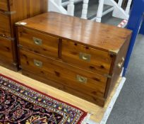 A pair of military style brass mounted pine three drawer low chests, width 77cm, depth 46cm,