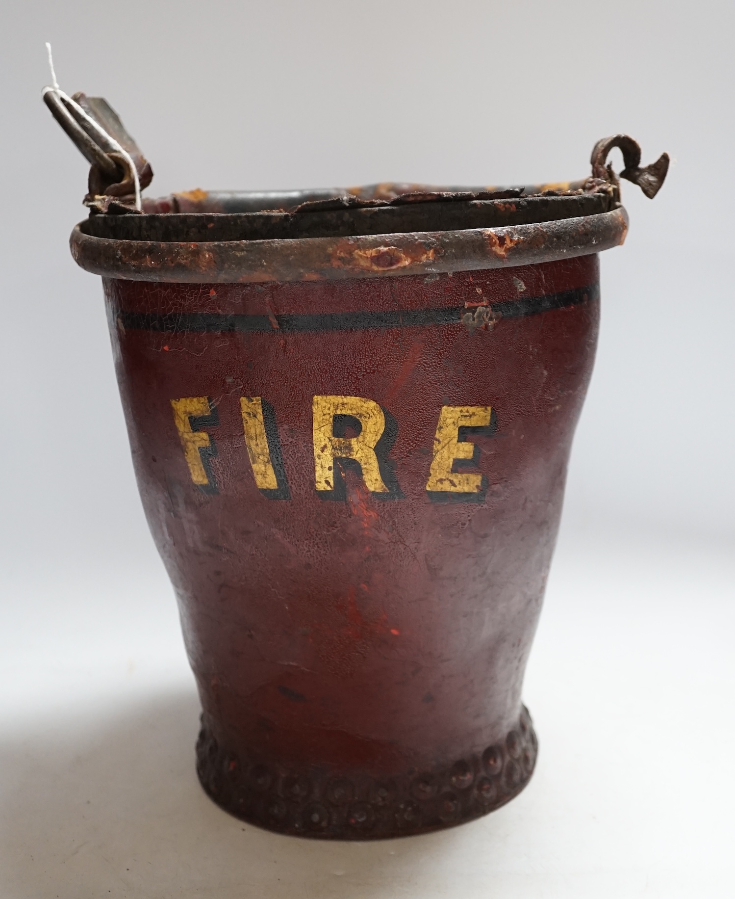 A Victorian leather fire bucket, 28cm high
