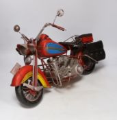 A faux tinplate motorcycle, 54cm long