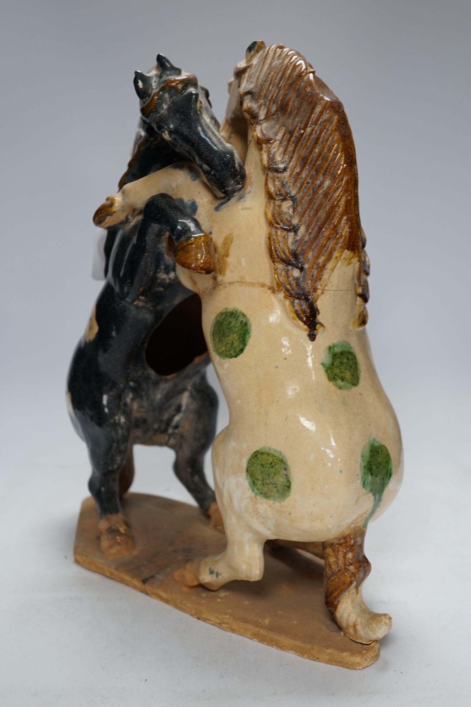 A Chinese sancai glazed group of fighting horses, Tang or later, 39cm high - Image 5 of 7